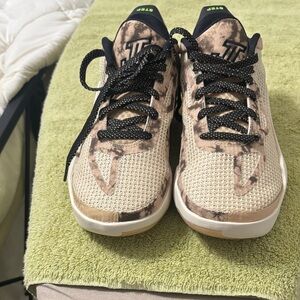 Tan and Black Athletic Shoes